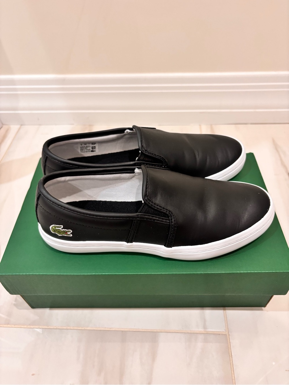 Lacoste Black Slip-On Leather Sneakers with White Sole